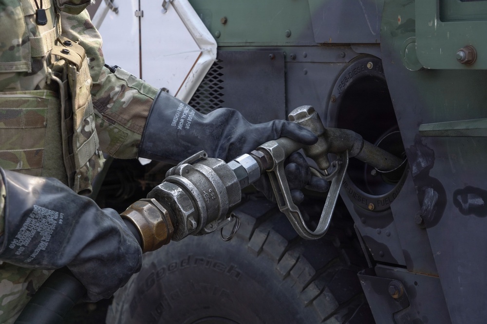 Soldiers refuel convoy vehicles during Freedom Shield 2026