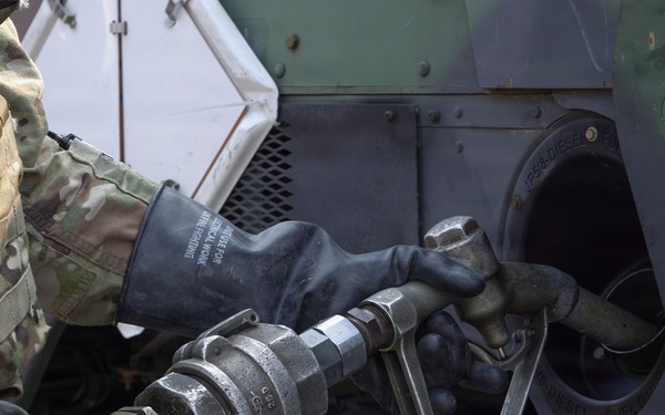 Soldiers refuel convoy vehicles during Freedom Shield 2026