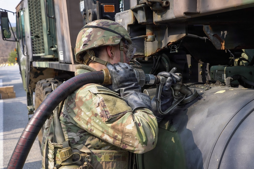 Soldiers refuel convoy vehicles during Freedom Shield 2026