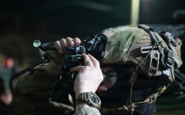 Soldier checks AN/PVS-31C Binocular Night Vision Device