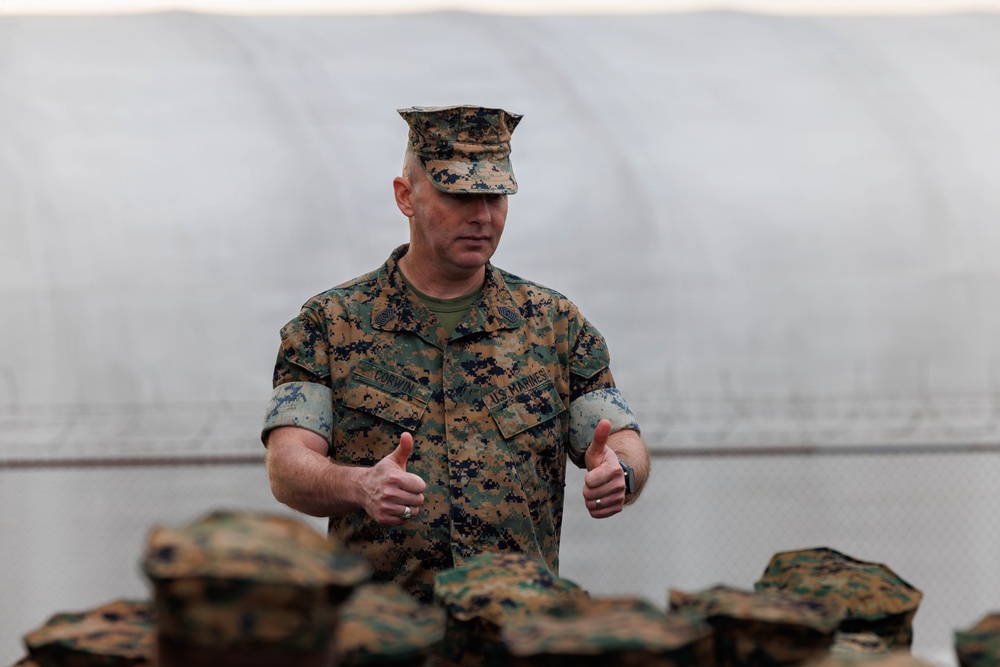 Marines aboard Quantico attend a Battalion Brief