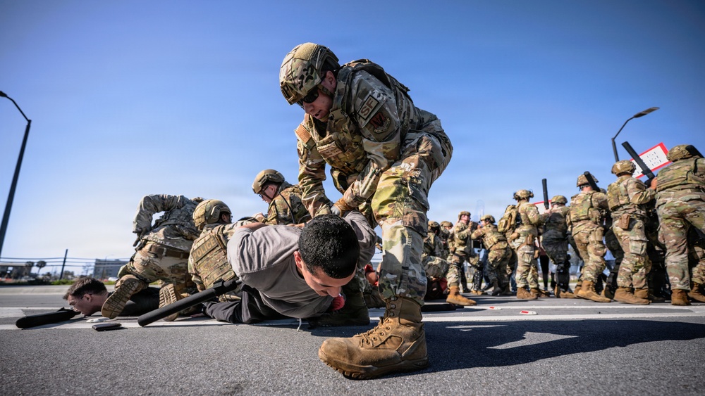 325th SFS, CES responds to simulated protest during Noble Panther 26-4