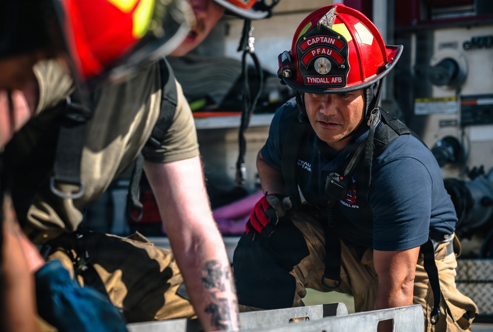 325th CES respond to simulated vehicle fire during Noble Panther 26-4