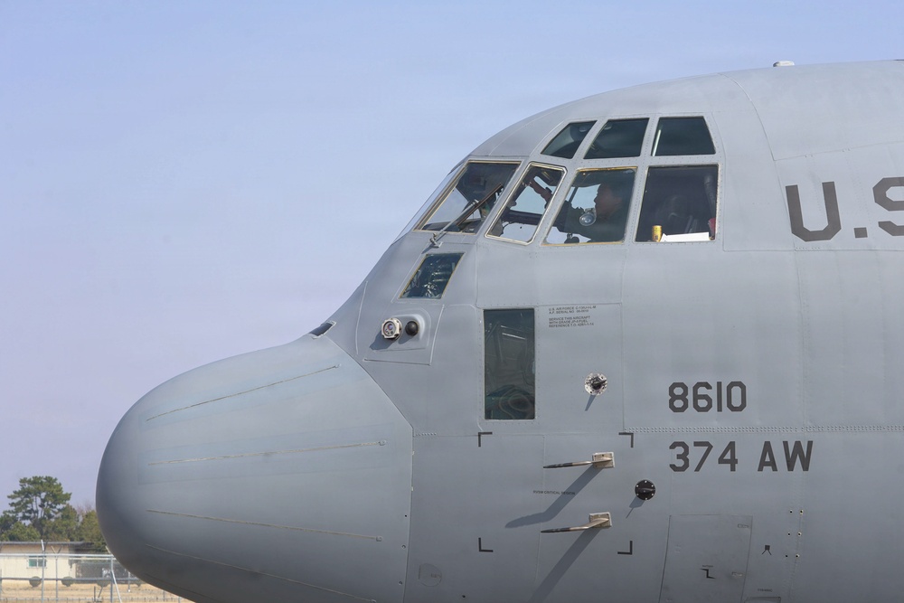 Aircrew prepares aircraft for simulated patient transport mission