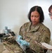Medics review patient information during exercise