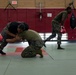 Marines participate in Marine Corps Martial Arts Program workshop