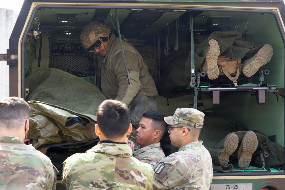 Simulated patients loaded for transport to local hospitals