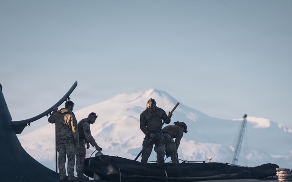 U.S. Recon Marines Launch Raiding Craft Operations from Submarine in Italy