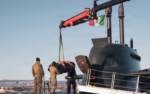 U.S. Recon Marines Launch Raiding Craft Operations from Submarine in Italy