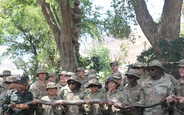 US Soldiers learn jungle survival from RTA Special Warfare Instructor