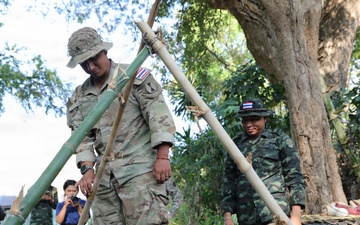 US Soldiers learn jungle survival from RTA Special Warfare Instructor