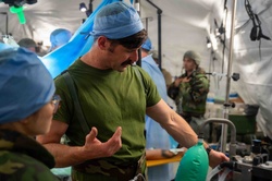 BM26: U.S. Airmen and Marines simulate austere medical operations