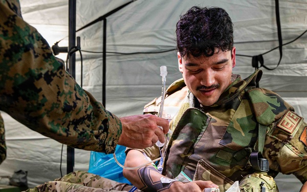 BM26: U.S. Airmen and Marines simulate austere medical operations
