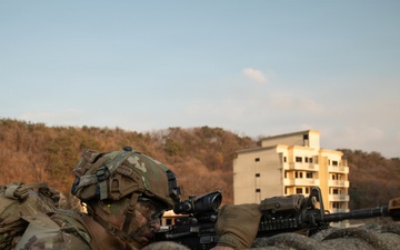 Soldier pulls security on rooftop