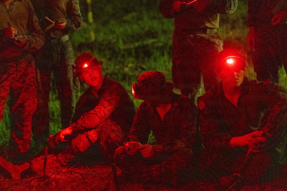 Task Force Ashland Marines Observe Terrain Model During Exercise Cobra Gold 26
