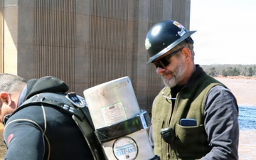 Divers help remove damaged trash rack at Arcadia Lake