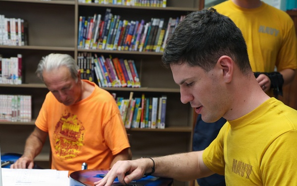 Navy Week 2026 Hosts Waikiki Public Library Guitar Lessons