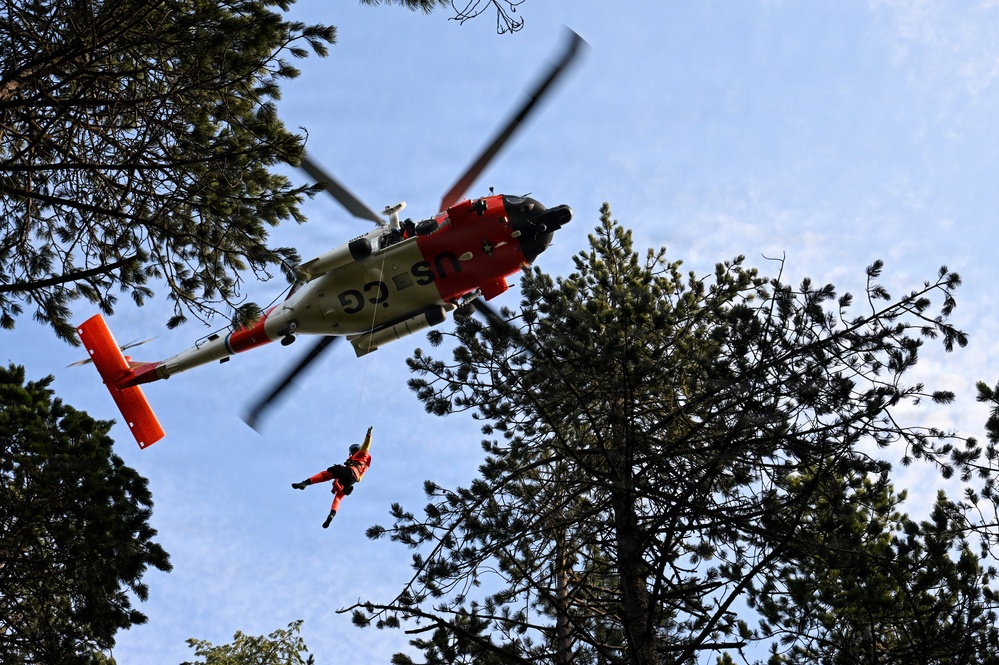 U.S. Coast Guard helicopter aircrews train as part of the Advanced Helicopter Rescue School at the Camp Rilea Armed Forces Training Center in Oregon.