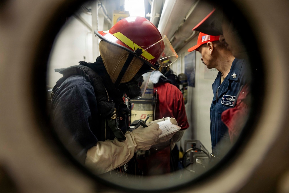 USS Iwo Jima Sailor Conduct Damage Control Training
