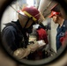 USS Iwo Jima Sailor Conduct Damage Control Training