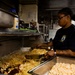 USS Iwo Jima Culinary Specialists Prepare Food