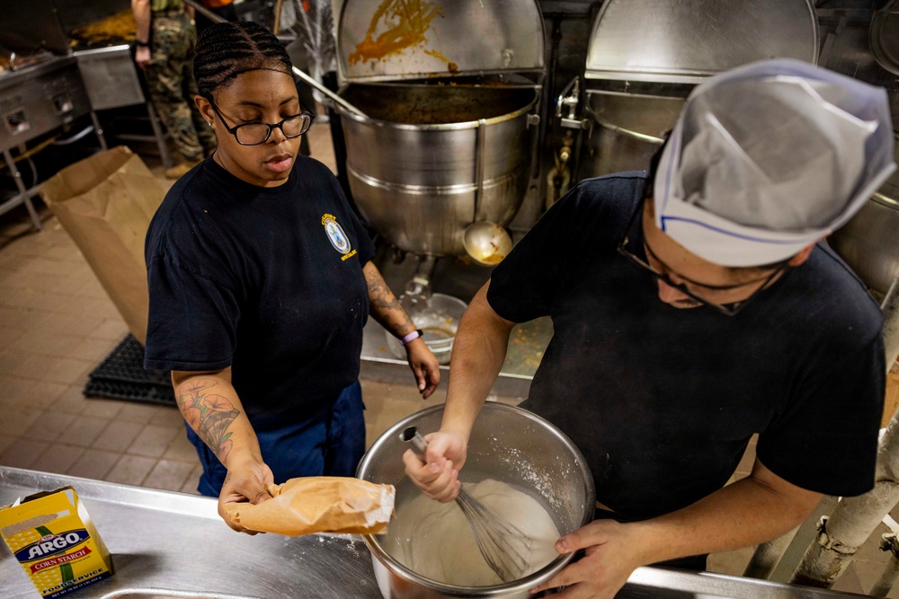 USS Iwo Jima Culinary Specialists Prepare Food
