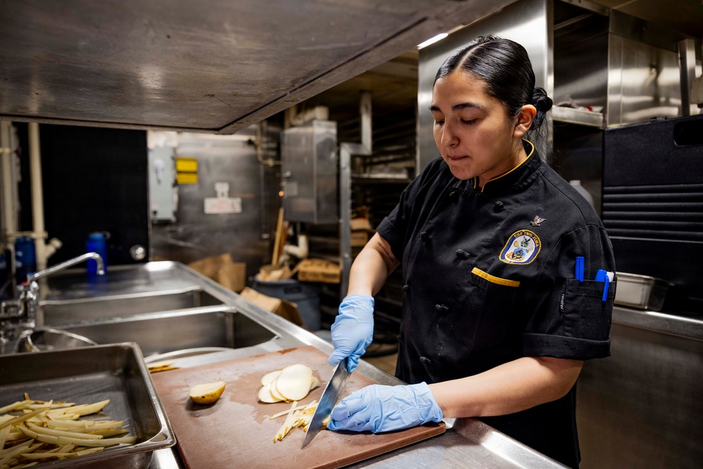 USS Iwo Jima Culinary Specialists Prepare Food