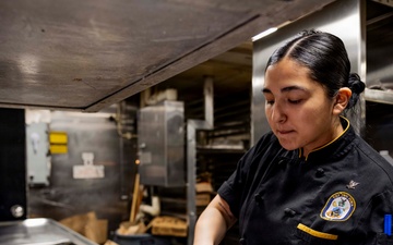 USS Iwo Jima Culinary Specialists Prepare Food