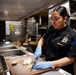 USS Iwo Jima Culinary Specialists Prepare Food