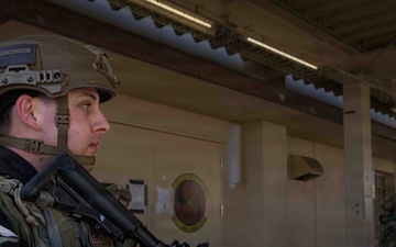 374th SFS respond to simulated ground attack during BM 26