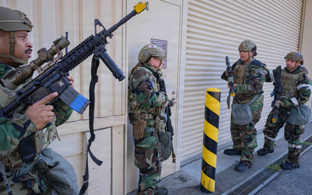 374 SFS respond to simulated ground attack during BM26