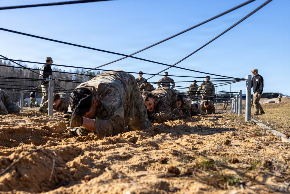 6-9 CAV Soldiers navigate an obstacle course