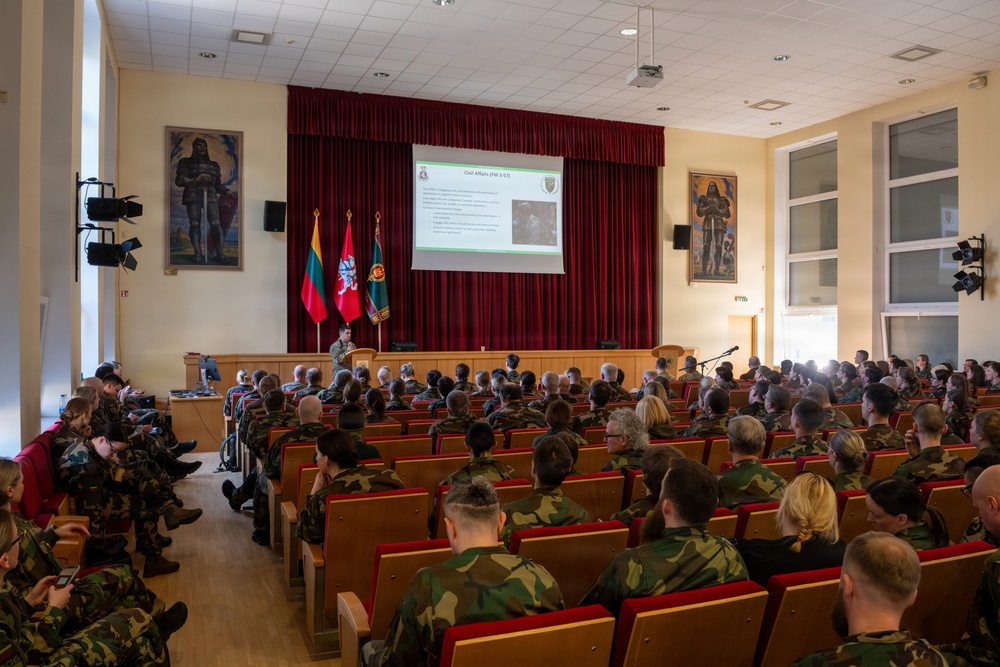 U.S. Army Capt. Jared Berken briefs Lithuanian audience on Civil Affairs and NATO CIMIC