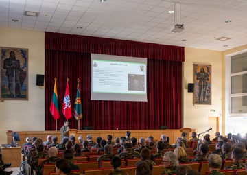 U.S. Army Capt. Jared Berken briefs Lithuanian audience on Civil Affairs and NATO CIMIC