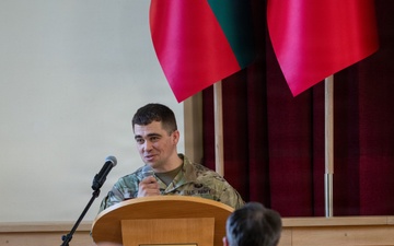 U.S. Army Capt. Jared Berken briefs Lithuanian audience on Civil Affairs and NATO CIMIC