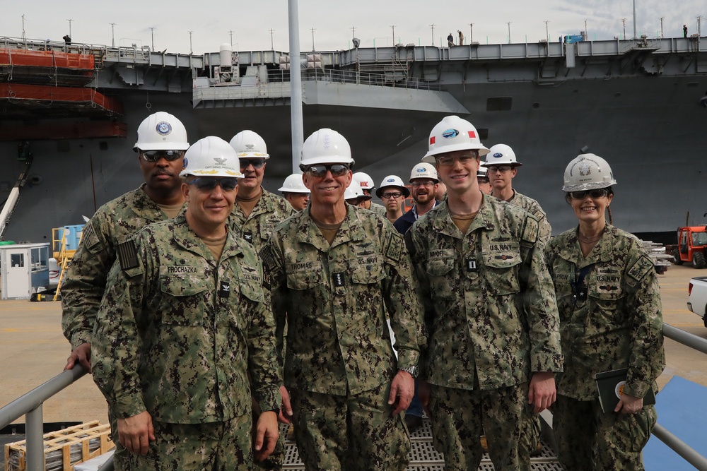 Navy Admiral visits Auxiliary Personnel Lighter
