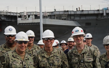 Navy Admiral visits Auxiliary Personnel Lighter