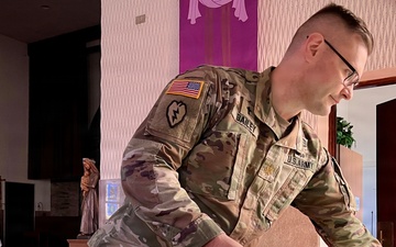 Army chaplain helps rescue burning trucker in Austria