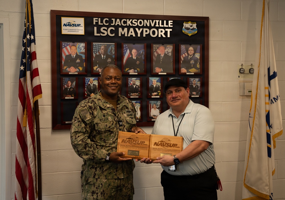 John Jimenez receives COY and COQ awards