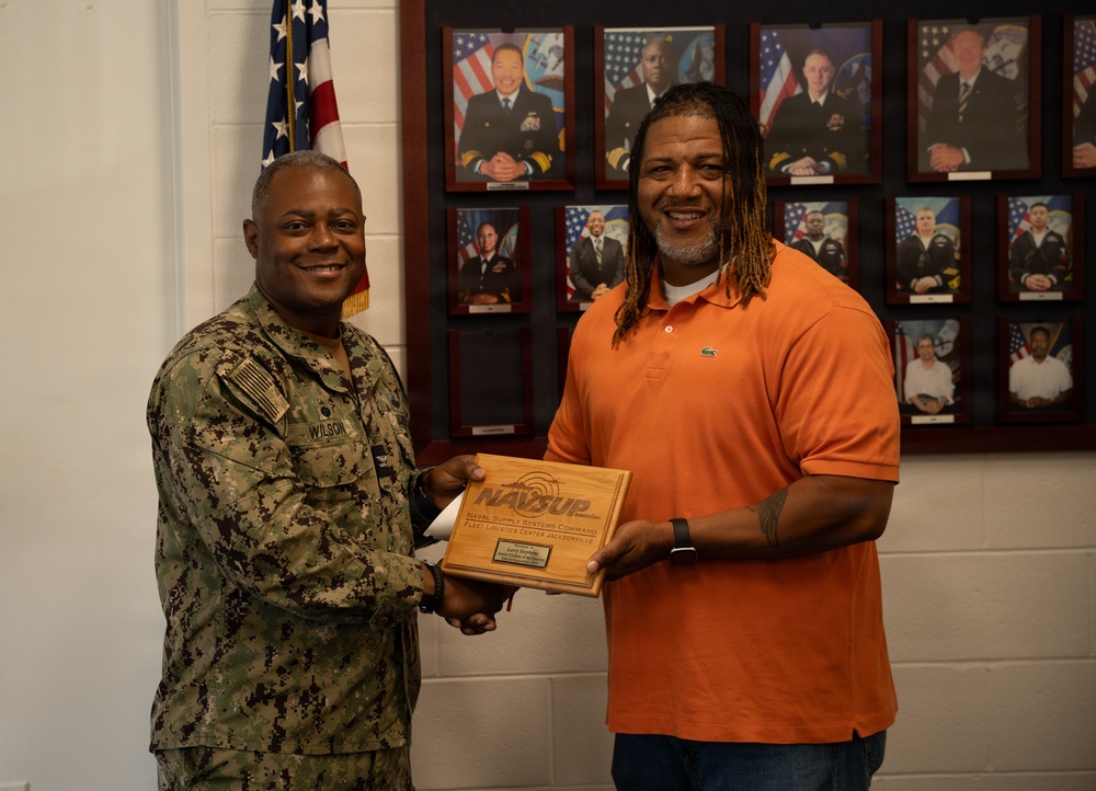 Larry Stephens receives COQ award