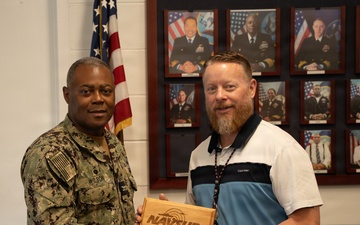 Eric Combs receives COQ award