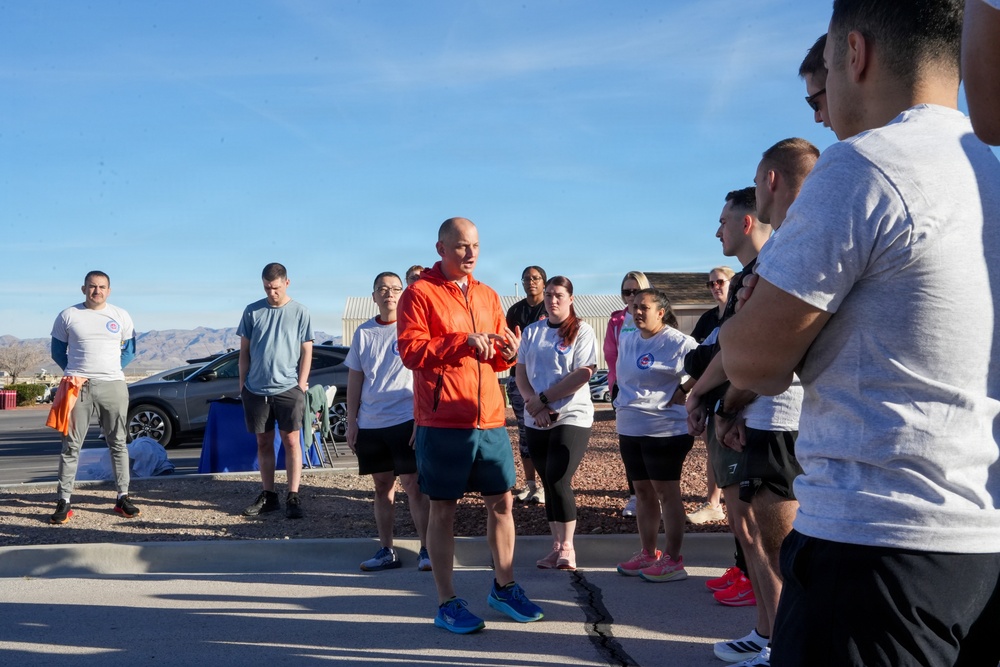 Creech AFB airmen run 3K to support teen dating violence awareness