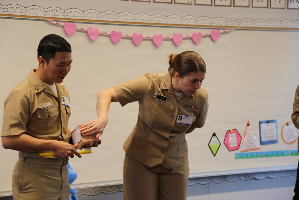 Lemoore Military Kids Learn to Defeat Cavities with Help from Navy Dentists