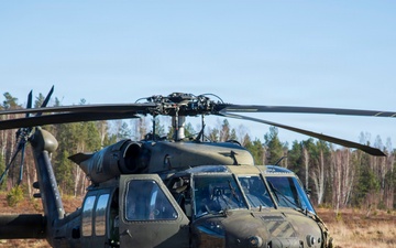 3rd CAB trains with Latvian Air Force M240 familiarization training