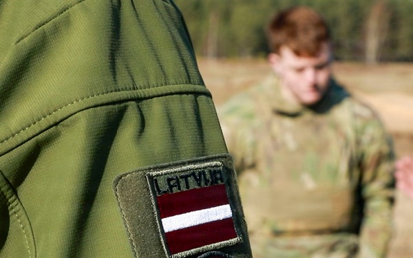 3rd CAB trains with Latvian Air Force M240 familiarization training