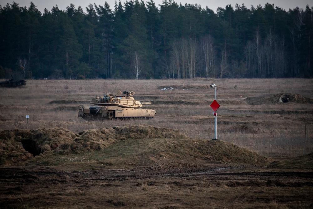 Enhancing fighting capabilities U.S. Army M1A2 Abrams conducts live-fire training with NATO allies