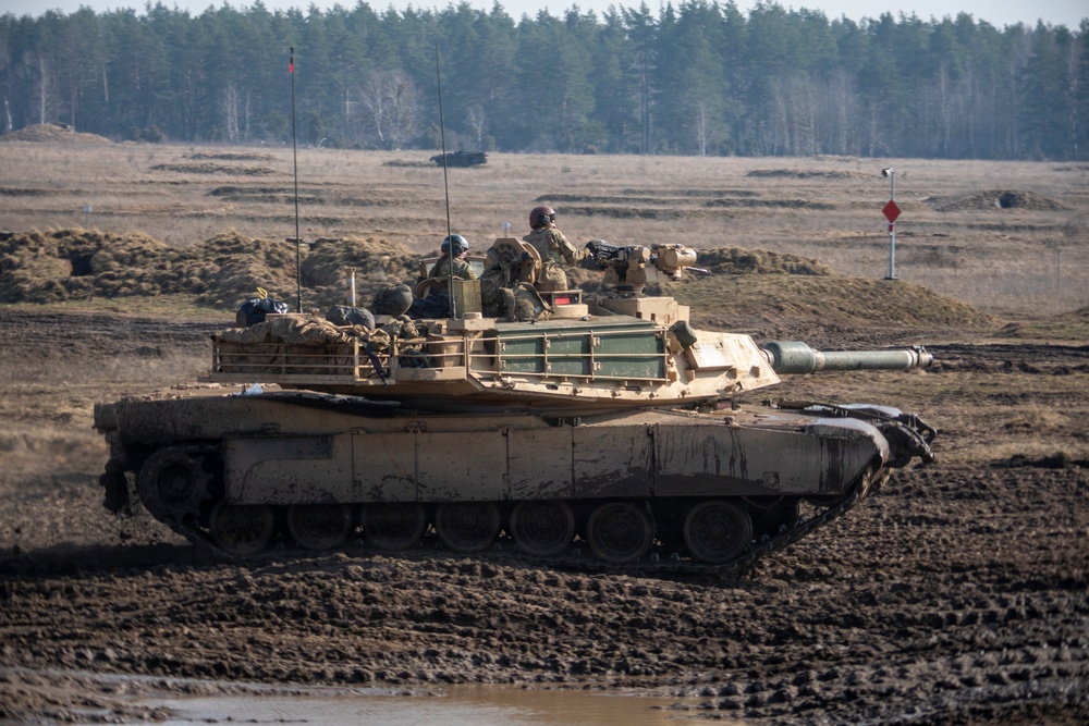 Enhancing fighting capabilities U.S. Army M1A2 Abrams conducts live-fire training with NATO allies