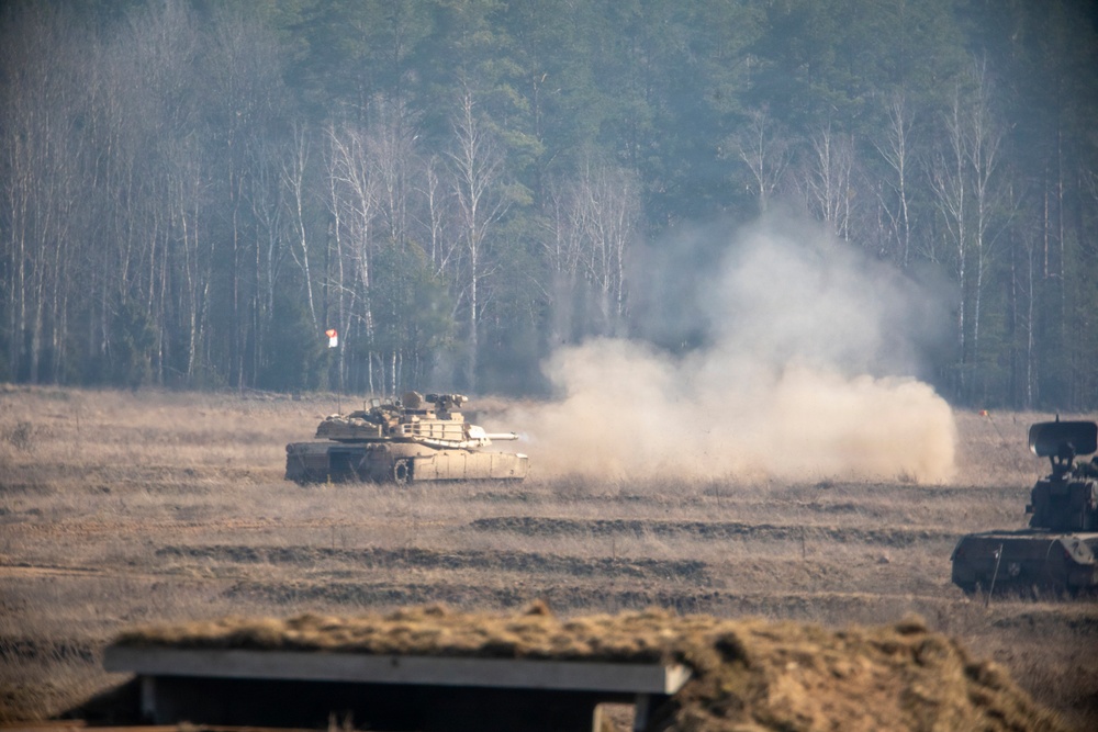 Enhancing fighting capabilities U.S. Army M1A2 Abrams conducts live-fire training with NATO allies