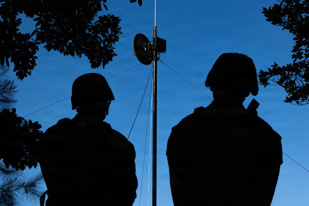 7th Communication Battalion Marines conduct strap exercise during Stormbreaker 26.2