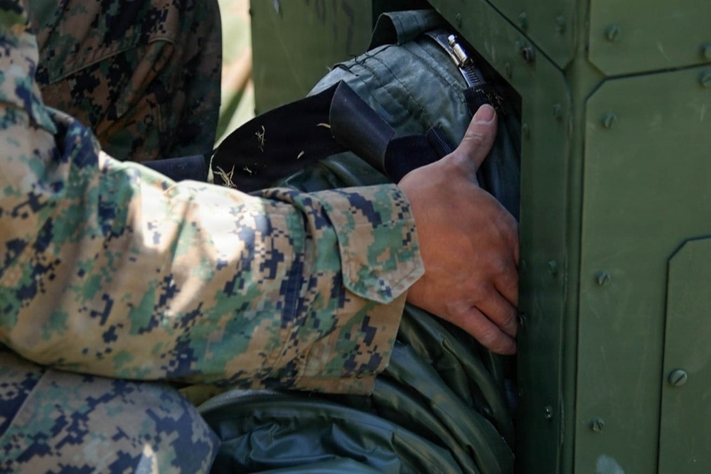 7th Communication Battalion Marines conduct strap exercise during Stormbreaker 26.2